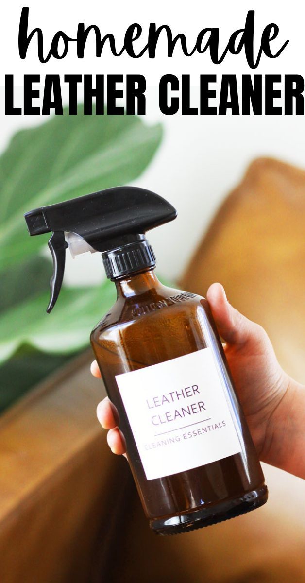 a hand holding a bottle of leather cleaner with the words homemade leather cleaner on it