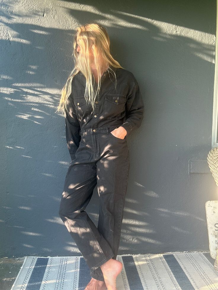 Amp up your style with our long sleeve utility jumpsuit! Made with a comfortable elastic waistband and featuring a button front, this jumpsuit is a perfect blend of fashion and function. The model, standing at 5'8" with measurements of 32-23-34, is seen wearing size S. Get ready to make a statement with our Top Shop jumpsuit! Model Standing, Free People Swim, Utility Jumpsuit, Swimwear Store, Beach Beauty, Swim Shop, One Piece Swim, Scarf Hairstyles, Denim Pants