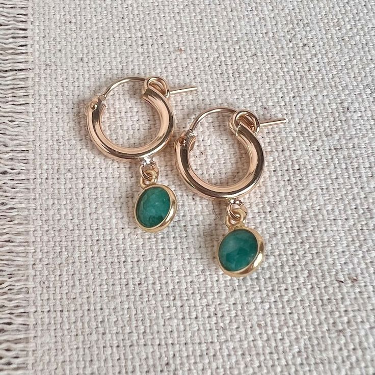 Green Dainty Huggie Jewelry, Dainty Green Huggie Jewelry, Everyday Green Huggie Earrings, Green Emerald Small Hoop Earrings, Small Hoop Emerald Earrings In Green, Dainty Green Huggie Earrings As Gift, Emerald Huggie Hoop Earrings For Gift, Green Huggie Earrings As May Birthstone Gift, Small Emerald Hoop Earrings As A Gift