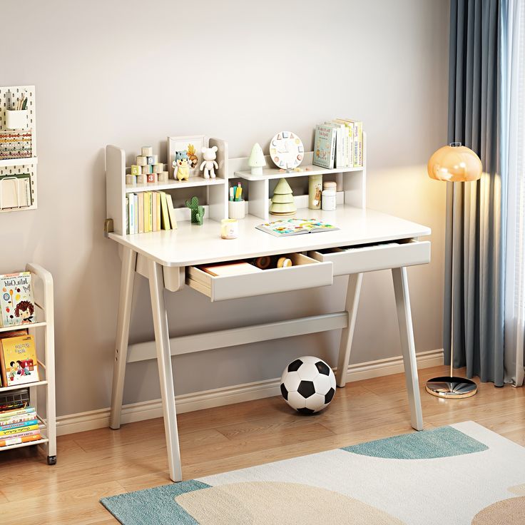 a child's room with a soccer ball, bookshelf and bookcase