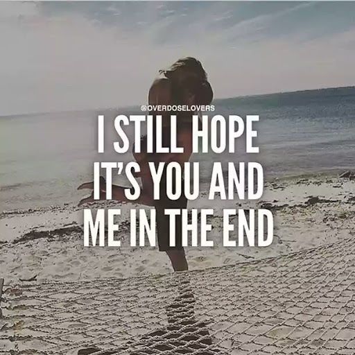 a woman standing on top of a sandy beach with the words still hope it's you and me in the end