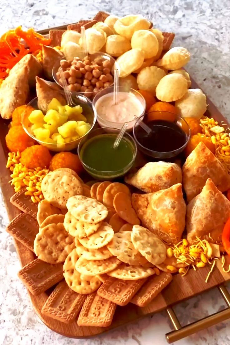 a platter filled with different types of snacks