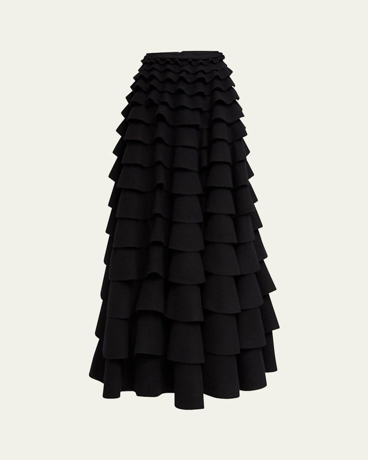 Valentino Garavani skirt finished with tiered ruffles    High waist    Hem falls below the knee    Aline silhouette    Invisible back zip    Virgin wool    Professional cleaning recommended    Made in Italy Chic Tiered Voluminous Maxi Skirt, Chic Voluminous Tiered Maxi Skirt, Formal Skirt With Voluminous Ruffles, Formal Voluminous Skirt With Ruffles, Evening Maxi Tiered Skirt With Ruffles, Evening Tiered Skirt With Ruffles, Evening Tiered Maxi Skirt With Ruffles, Chic Tiered Voluminous Skirt, Chic Voluminous Tiered Skirt