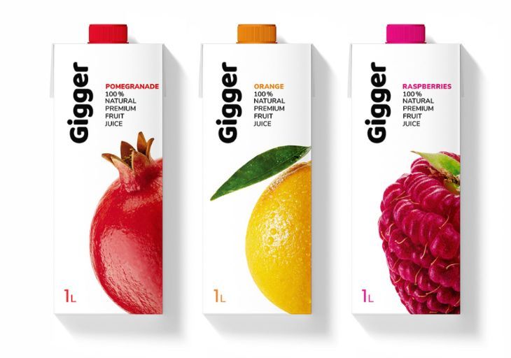 three cartons of juice with different fruits on the top and bottom, one orange, one raspberry