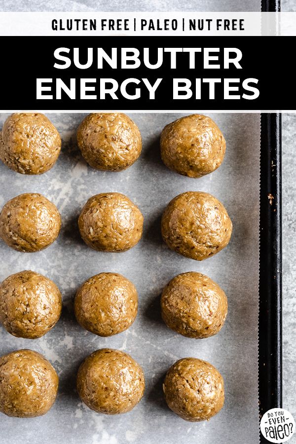 a baking sheet filled with energy bites and text overlay reads gluten free paled nut free sunbutter energy bites