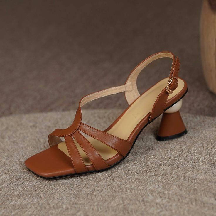 Handmade with premium leather. these open toe sandals are stylish and unique. Upper: Genuine Leather Lining: Genuine Leather Outsole: TPR Toe Shape: Open Toe Heel: 6.5cm/2.5'' Closure: Buckle Strap is_handmade: Yes Beach Sandals With Padded Heel And Open Toe, Elegant Brown T-strap Sandals For Summer, Chic T-strap Sandals With Padded Heel And Open Toe, Leather Slingback Sandals With Padded Heel For Summer, Chic Open Toe T-strap Sandals With Padded Heel, Beach Slingback Sandals With Padded Heel, Formal Open Toe Slingback Sandals For Summer, Spring Open Toe T-strap Sandals With Padded Heel, Chic Open Toe T-strap Sandals With Buckle