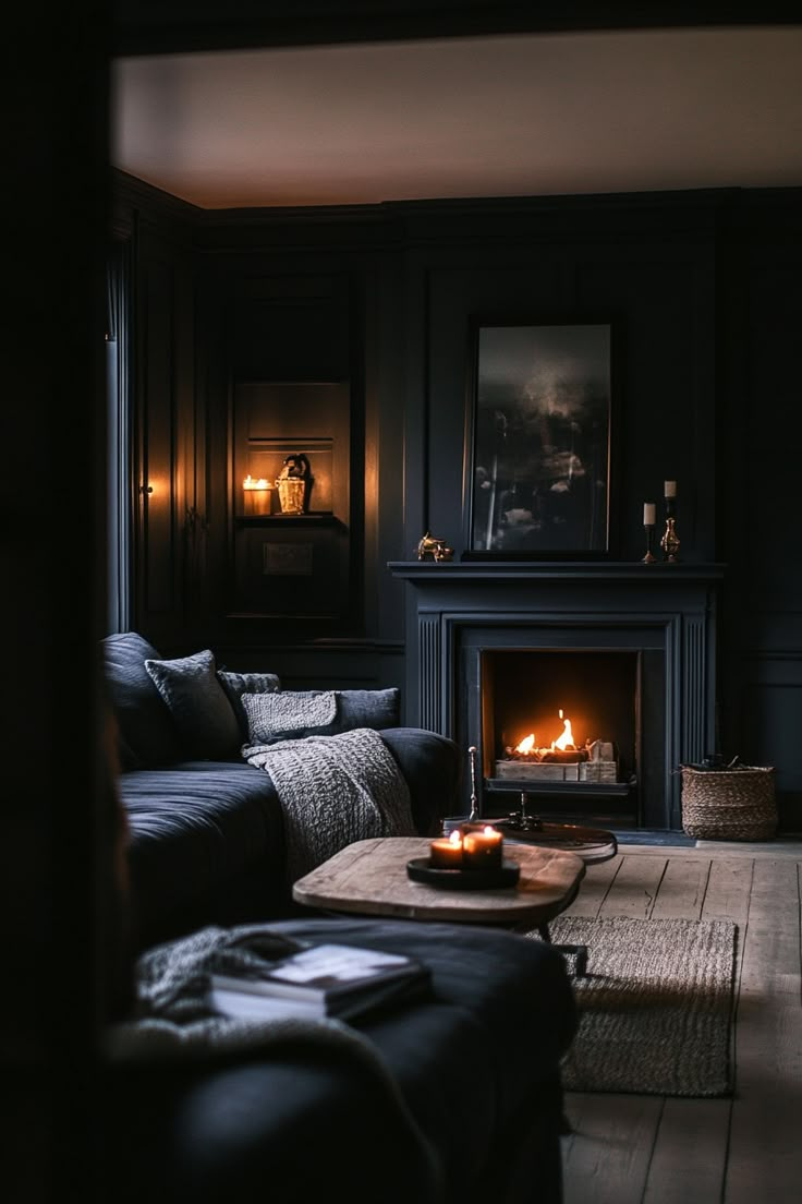 a living room filled with furniture and a fire place in the middle of the room