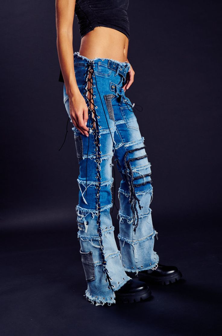 LAY LOW DISTRESSED DENIM FLARE PANT – AKIRA Edgy Mid-rise Medium Wash Flare Jeans, Trendy Straight Leg Festival Bottoms, Trendy Fitted Rigid Denim Bottoms, Trendy Bottoms With Frayed Hem For Festival, Trendy Festival Bottoms With Frayed Hem, High Rise Denim Jeans For Festivals, Trendy Denim Pants For Festivals, Trendy Denim Festival Pants, Trendy High Rise Jeans For Festivals