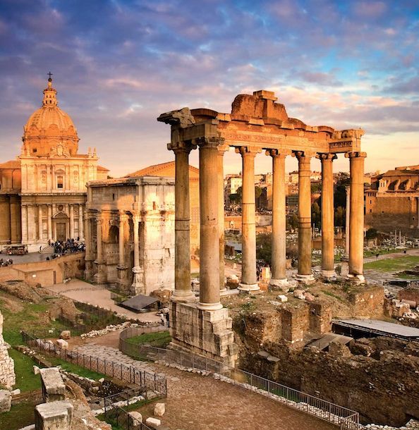 the ruins of an ancient city are shown in this photo, with columns and other structures