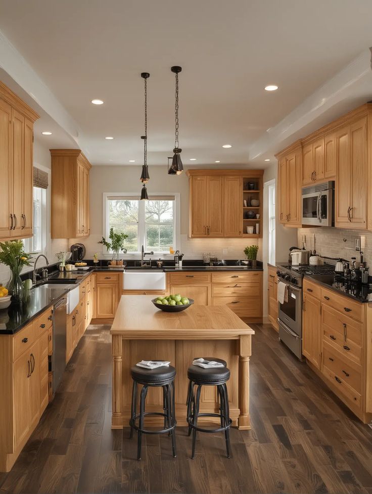 a large kitchen with wooden cabinets and black counter tops, along with two stools