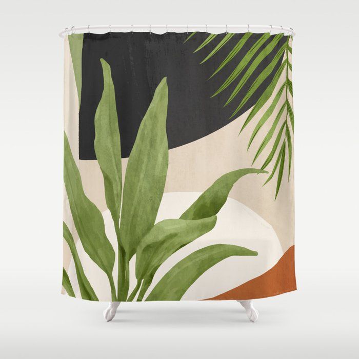 a shower curtain with green leaves on it and an orange, black, white and beige background