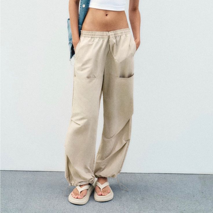 Nwt // Zara - Mid Rise Nylon Pants Size: L Color: Mid-Ecru (Pale Beige Tone) Nwt // Never Worn See Image For Fit/Fabric Details Blogger Favorite Khaki Full-length Parachute Pants For Summer, Spring Khaki Straight Leg Sweatpants, Beige Cargo Pants For Fall, Beige Leisure Pants For Fall, Khaki Straight Leg Sweatpants For Spring, Straight Leg Khaki Sweatpants For Spring, Full Length Khaki Parachute Pants For Spring, Summer Beige Cargo Bottoms, Beige Summer Cargo Bottoms