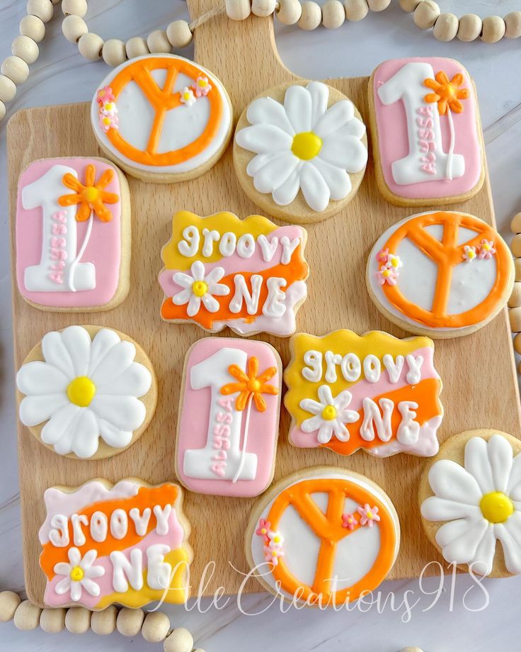 Groovy One 🌸🧡 Pricing? 👉🏻 https://msha.ke/alecreations918 • • • • #alecreations918 #tulsasmallbuisness #tulsaoklahoma #decoratedsugarcookies #customcookies #cookie #cookies #inspirationcookies #cookiesofinstagram #desserts #dessertporn #dessertideas #partyideas #party #sugarcookies #royalicing #royalicingcookies #cookies #cookiesideas #royalicingideas #groovyone #groovyonebirthday #groovyonecookies #groovyonetheme #groovyoneparty #partycookies Groovy 1 Cookies, One Groovy Babe Birthday Cookies, Groovy One Cookies, Groovy Cookies, Groovy One, Butterfly Cookies, Cookie Ideas, Boys Birthday, Birthday Cookies