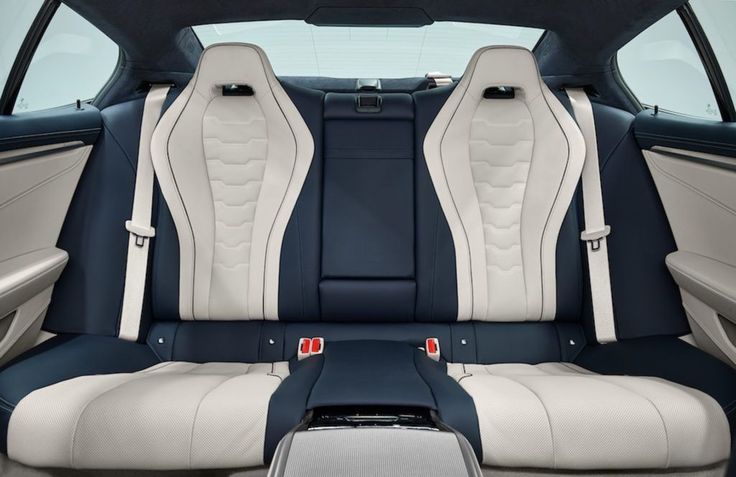 the interior of a car with two rows of seats and one row of rear seats