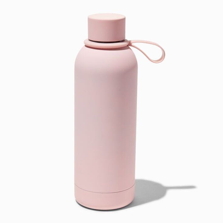 a pink water bottle is shown on a white background with a light shadow behind it