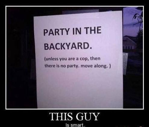 a party in the backyard sign posted on a door