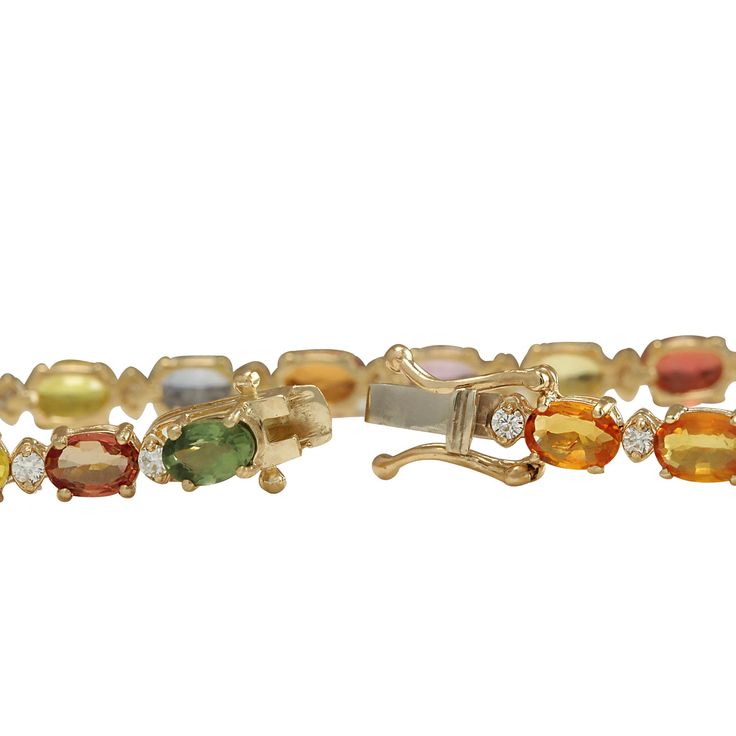 Stamped: 14K Yellow Gold Total Bracelet Weight: 9.6 Grams Bracelet Length: 7.5 Inches Bracelet Width: 4.35 mm Gemstone Weight: Total Natural Sapphire Weight is 12.03 Carat (6.00x4.00mm) Quantity: 20 Color: Multicolor Diamond Weight: Total Natural Diamond Weight is 0.71 Carat Quantity: 20 Color: F-G, Clarity: VS2-SI1 Face Measures: N/A Sku: [703087W] Elegant Multi-stone Oval Tennis Bracelet, Elegant Oval Multi-stone Tennis Bracelet, Oval Multi-stone Tennis Bracelet In Fine Jewelry Style, Heirloom Gold Multi-stone Bracelets, Heirloom Gold Bracelets With Multi-stone, Classic Oval Multi-stone Bracelet, Heirloom Yellow Gold Multi-stone Bracelets, Yellow Gold Multi-stone Oval Bracelet, Yellow Gold Multi-stone Diamond Bracelet Gift