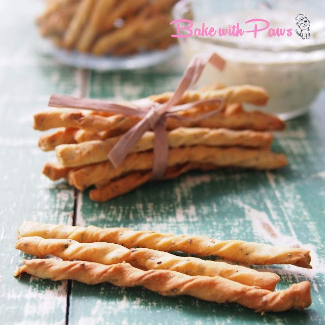 some bread sticks are on a table