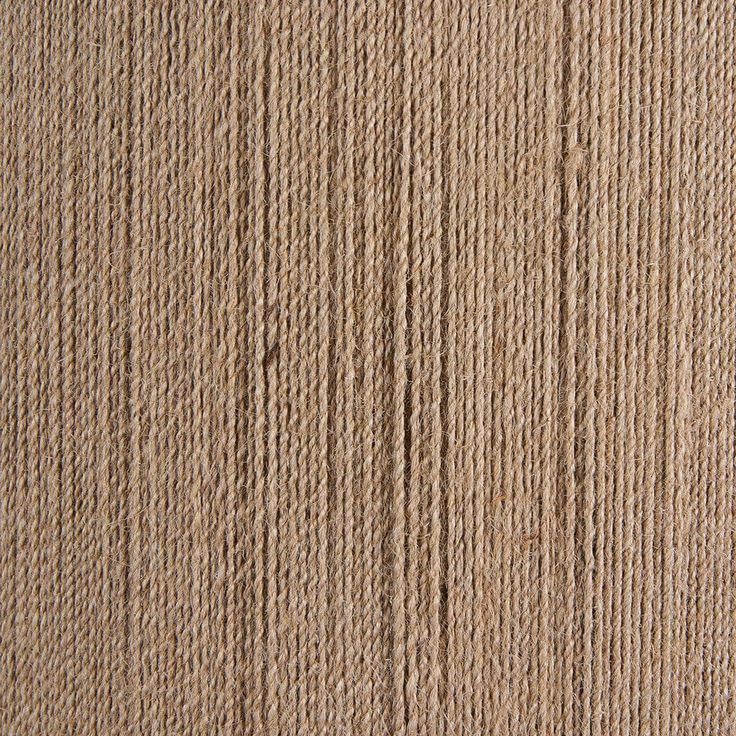 a close up view of the textured surface of a carpeted area with vertical lines