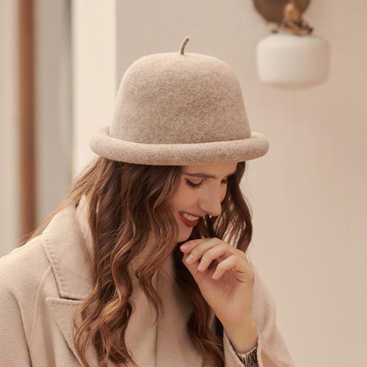 The EMES SHOP hat is detailed with a luxe soft material. Features a solid color. vintage vibe. and bowler hat design.MATERIAL:100%Wool BlendCIRCUMFERENCE MEASUREMENTS: 56-58cm 22-23in Beige Flat Brim Felt Hat For Winter, Vintage Fall Felt Hat, Winter Beige Brimmed Boater Hat, Beige Brimmed Boater Hat For Winter, Classic Solid Color Cloche Hat For Fall, Classic Solid Cloche Hat For Fall, Classic Fall Cloche Hat, Beige Short Brim Felt Hat For Winter, Beige Felt Hat With Short Brim For Winter