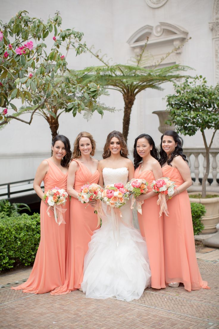 a group of women standing next to each other