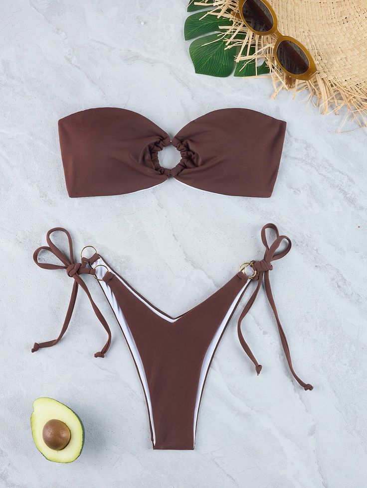 Indulge in timeless elegance with our strapless bikini, exuding sophistication and allure. Crafted from high-quality materials, this exquisite swimwear ensemble boasts a sleek and minimalist design, perfect for making a statement by the poolside or on the beach. The strapless top offers a flattering fit, while the bottoms accentuate your curves, enhancing your natural beauty with every wear. Elevate your swimwear collection with this must-have piece that seamlessly blends comfort, style, and sen Strapless Swimwear, Printed Ties, Comfort Style, Swimwear Collection, Chest Pad, Minimalist Design, Strapless Top, Timeless Elegance, Natural Beauty