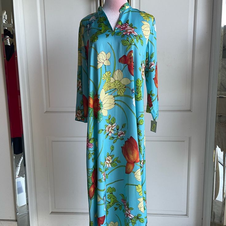 Non Zipper Caftan. Brand New. Never Worn. Vibrant Colors. Great For Lounging Around Sipping Wine. Blue Silk Kurta For Summer, Spring Silk Maxi Length Kurta, Spring Blue Floral Print Kurta, Blue Floral Print Tunic Kurta, Blue Kimono Sleeve Dress For Daywear, Floral Print Long Sleeve Kaftan For Daywear, Blue Dress With Kimono Sleeves For Daywear, Blue Dresses With Kimono Sleeves For Daywear, Blue Floral Print V-neck Kimono