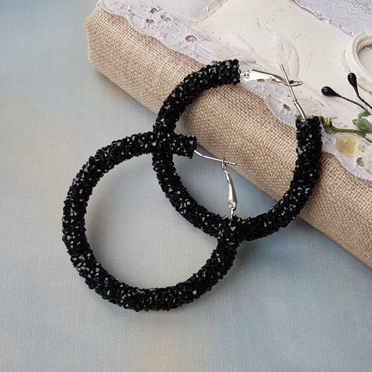 Stylish black color  sparkle crystal hoop earrings! New jewelry trend - statement bright, shiny bold hoop earrings. Cute 21st birthday gift for her jewelry idea. ♥ SIZE     Earrings are approximately  in diameter - S size 1.2 inches (3 cm) - L size 1.6 inches (4 cm) - M size 2.2 inches (5.5 cm) - XL size 3 inches (7.5 cm) ♥ 100% handmade ♥ Packed in gift box ♥ Very light ♥ READY TO SHIP!! ✅You can see video about this hoop earrings there https://youtu.be/93p-nbATz4g  Advice on use and care * Never wear any jewelry while bathing or showering. Chlorine can cause damage. Please do not swim and did not take a shower in beaded jewelry * Try to avoid the drop, shock and compression of jewelry from beads Since this is handmade item, every new good may be vary slightly, but the overall look will m Snow Earrings, Black Hoop Earrings, Beadwork Jewelry, Black Hoops Earrings, Mommy Quotes, Bling Earrings, Crown Necklace, Beaded Crochet, Earrings Big