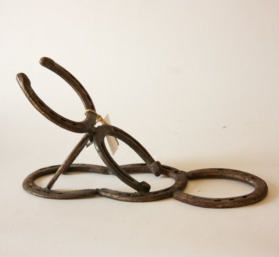 an old pair of scissors sitting on top of each other