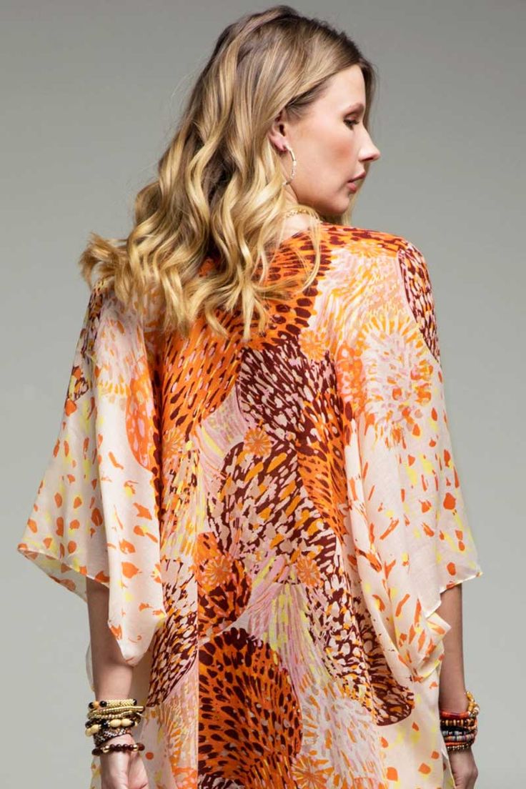 Airy vibrant dandelion print kimono with side slits, beautiful to pair with white tank and white jeans or solid tank dress! APPROX. L 73" W 36" 100% Polyester White Tops With Kimono Sleeves For Spring, Multicolor Rayon Blouse For Spring, Spring Patterned Tunic Blouse, Open Front Blouse For Beach In Spring, Open Front Blouse For Beach, Spring Season, Open Front Blouse For Spring Beach Outing, Spring Open Front Blouse For Beach, Spring Beach Blouse With Kimono Sleeves, Kimono Sleeve Blouse For Beach In Spring