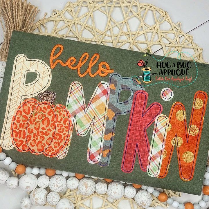 a sign that says hello pumpkin on it with some eggs and other decorations around it