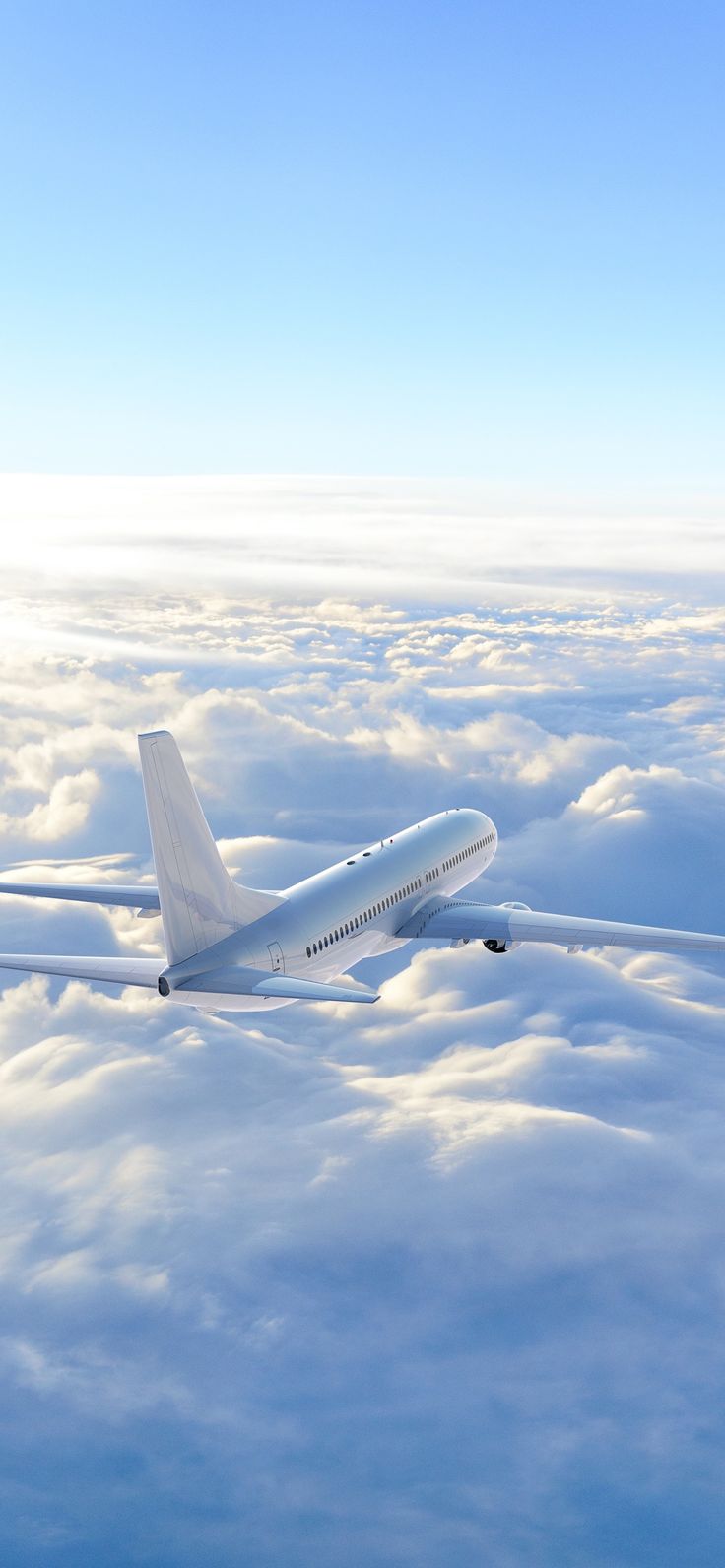 an airplane is flying high above the clouds