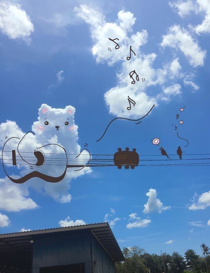 there are many kites being flown in the sky with music notes flying above them