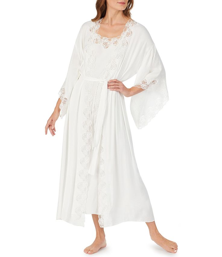 From Eileen West&#x2C; this nightgown features:Solid&#x2C; silky woven satin fabric3/4 kimono sleevesIntricate floral lace trimmed detailSide seam pocketsSet-in belt at waistApprox. 54" lengthPolyesterMachine washImported. Silk Sleepwear With Lace Trim For Loungewear, Spring Silk Sleepwear With Lace Trim, Feminine Silk Nightgown For Loungewear, Elegant Summer Bedtime Robe, Silk Nightgown With Lace Trim For Loungewear, Elegant Spring Robe For Bedtime, Elegant Spring Bedtime Robe, Elegant Beach Nightgown For Spring, Eileen West