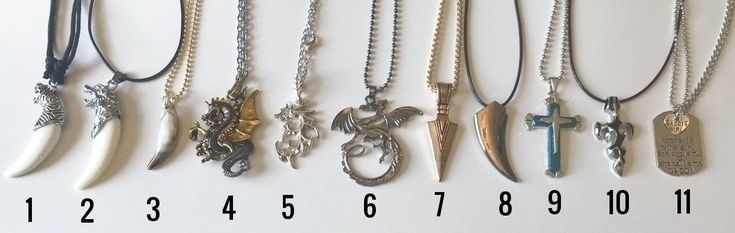 "You will have your choice of which necklace you want. There are stainless steel dragon necklaces, alloy with resin wolf head(approx. 2 1/4\")2 different head choices, colorful dragon(approx. 2 1/2\")stainless wolf tooth shaped(approx. 1 1/2\"), silver/black cross(approx. 1 1/2\") blue cross(approx. 1 1/2\"), gold toned arrow, a sentimental necklace-2 choices(daddy's girl), and a faux yak bone tooth shaped(approx. 1 1/2\"). They are numbered below the necklaces and the one daddy's girl that is a Casual Jewelry With Adjustable Chain As Gift, Casual Jewelry With Adjustable Chain For Gifts, Casual Pendant Necklace For Gift, Casual Nickel Free Necklace For Gift, Casual Nickel-free Necklace For Gift, Casual Silver Jewelry As Gift, Casual Silver Jewelry For Gifts, Metal Pendant Necklaces For Father's Day, Casual Metal Necklaces For Gifts