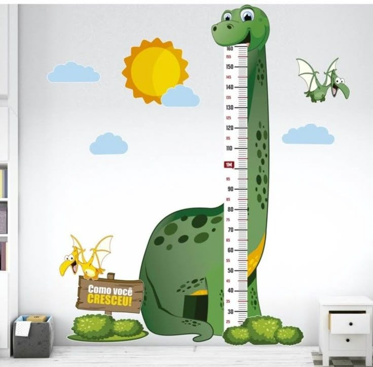 a child's growth chart wall sticker with a dinosaur holding a ruler in front of it