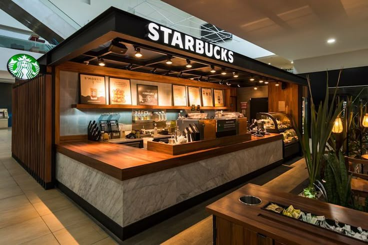 starbucks coffee shop interior with counter and seating area