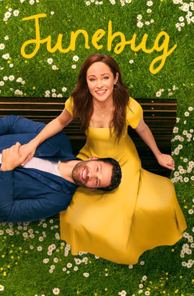 a man and woman sitting on a bench in front of flowers with the words junebug above them