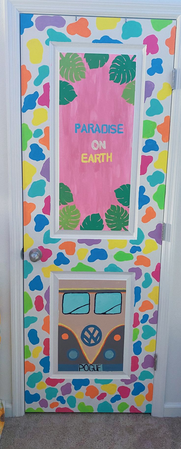 a door decorated to look like a bus with the words paradise on earth painted on it