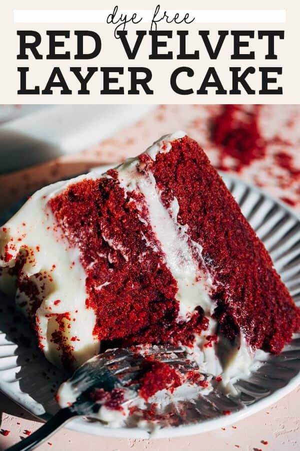 a slice of red velvet layer cake on a plate