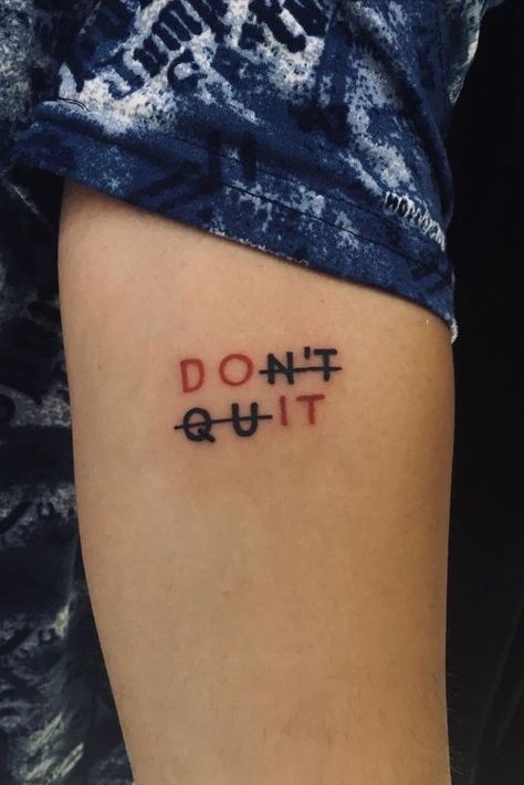 a tattoo that says don't quit on it