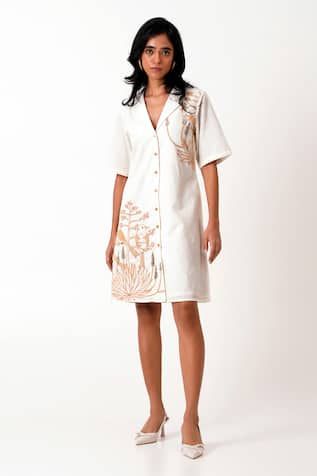 White woven shirt dress with floral bird motif embroidery and placement thread work. - Aza Fashions Spring V-neck Chikankari Embroidered Dress, V-neck Embroidered Dress With Embroidered Neckline, Embroidered Cotton Shirt Dress For Summer, Summer Floral Embroidery Dress With Relaxed Fit, Spring Embroidered Relaxed Fit Dress, Cotton V-neck Dress With Resham Embroidery, Embroidered Summer Dresses For Work, Elegant Summer Embroidered Dress With Tonal Embroidery, Summer Workwear Dresses With Embroidery