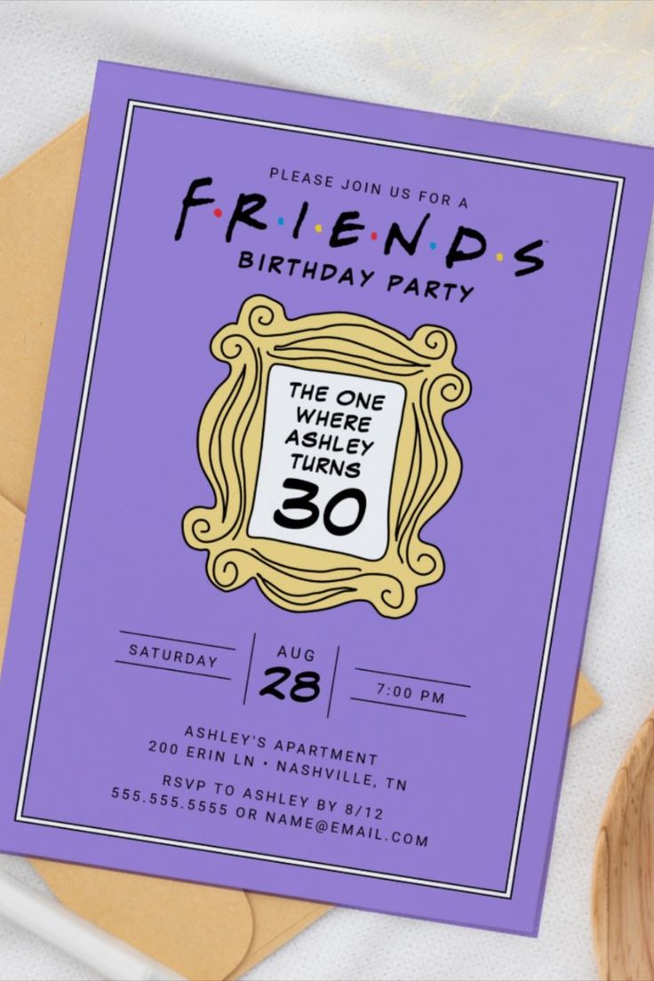 a purple birthday party card with the words friends on it and a wooden spoon next to it