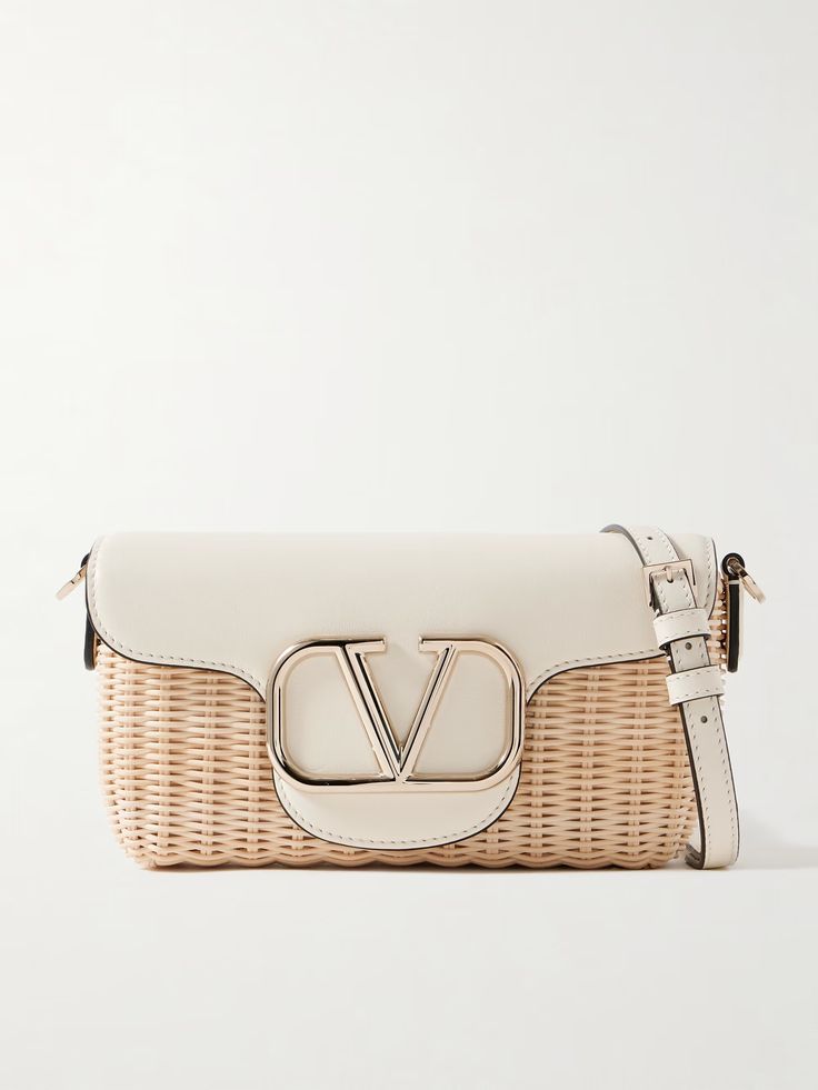 Shop VALENTINO GARAVANI Locò embellished leather-trimmed raffia shoulder bag, Explore the latest VALENTINO GARAVANI women's collection today on NET A PORTER Luxury Beige Straw Bag With Gold-tone Hardware, Designer Natural Straw Bag With Gold-tone Hardware, Designer Rectangular Straw Bag With Gold-tone Hardware, Designer Intrecciato Weave Shoulder Bag For Vacation, Luxury Beige Straw Bag With Detachable Strap, Designer Straw Bag With Gold-tone Hardware, Luxury Natural Straw Bag With Gold-tone Hardware, Luxury Rectangular Straw Bag For Shopping, Luxury Beige Woven Leather Bag