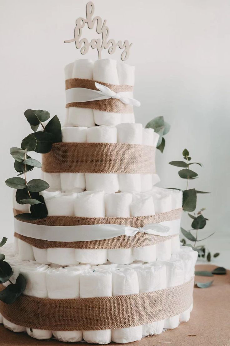 a wedding cake made out of diapers and burlocks