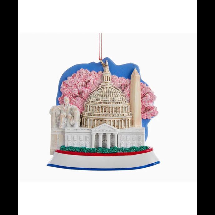 the capitol building ornament is shown with pink flowers