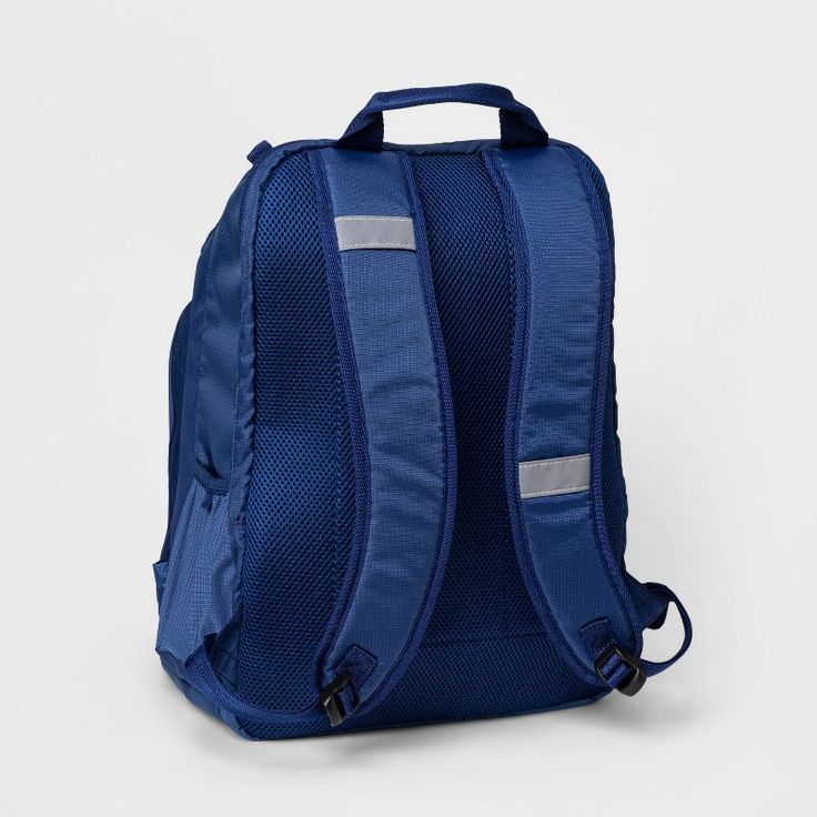 a blue backpack sitting on top of a white table