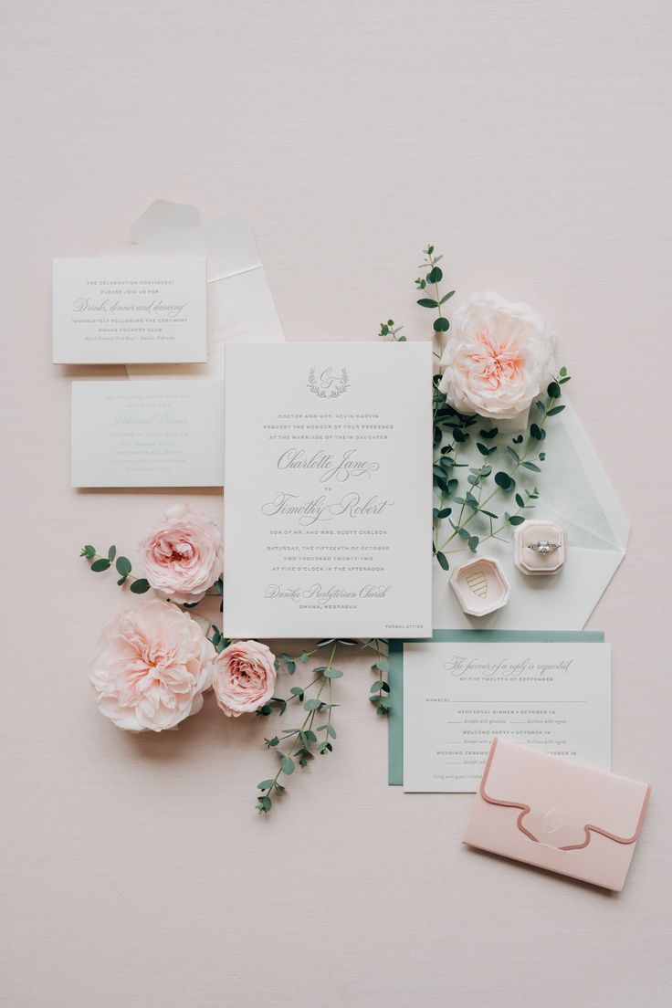 the wedding stationery is laid out and ready to be used