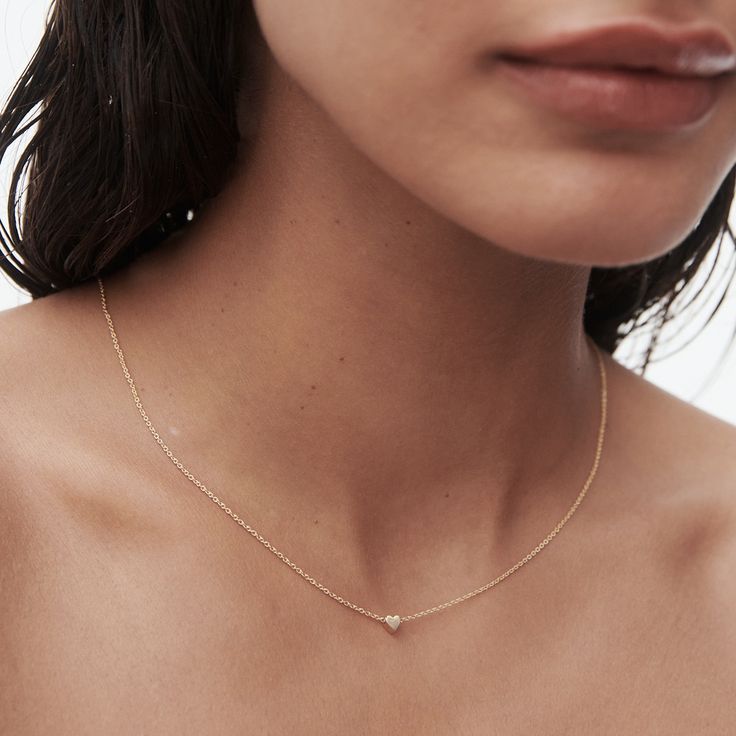 T I N Y ∙ I N I T I A L ∙ H E A R T ∙ N E C K L A C E The most unique jewelry you can find, the perfect gift for you or your loved one. W H Y ∙ Y O U 'L L ∙ L O V E ∙ I T• It's dainty and can be worn every day• A special piece you'll treasure for life• High-quality materials and attention to detail. • Tarnish proof, Waterproof, and Hypoallergenic • Replacement Guarantee and Fade proof warranty D E T A I L S • Material: Available in The Highest Quality 14K Gold Vermeil, 14K Rose Gold Vermeil, or Initial Heart Necklace, Tiny Heart Necklace, Custom Initial Necklace, Heart Charm Necklace, Solid Gold Necklace, Jewelry Studio, Silver Heart Necklace, Tiny Heart, Sweet Heart