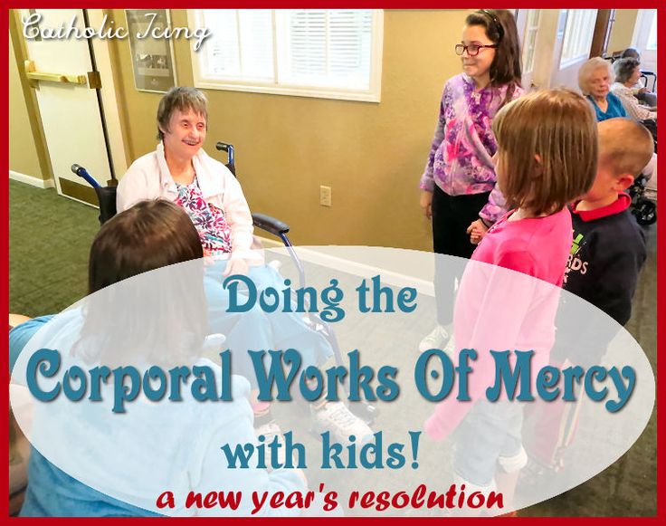 a group of people standing around a table with the words doing the corporate works of mercy with kids